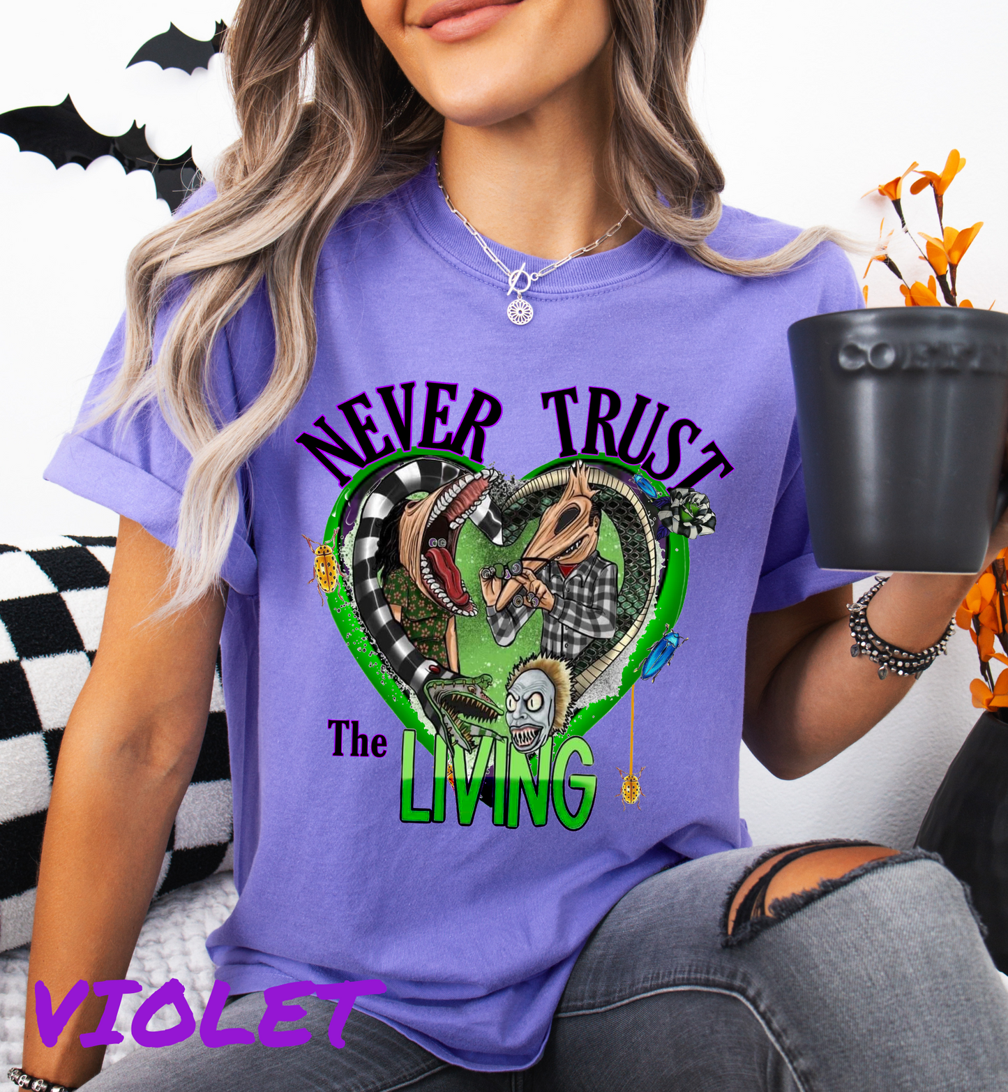 NEVER TRUST THE LIVING GRAPHIC TEE