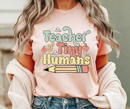 TEACHING TINY HUMANS GRAPHIC TEE